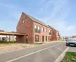 Maaseik moderne nieuwbouw met rode steen en zadeldak