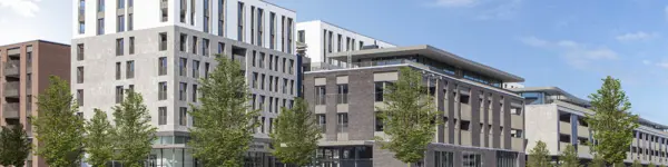 Sleek and modern buildings in Quartier Bleu, Hasselt, featuring contemporary design.