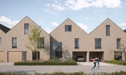 Row of modern houses, gabled roofs, light-colored bricks, open garage, car inside, skateboarder. Varsenare.