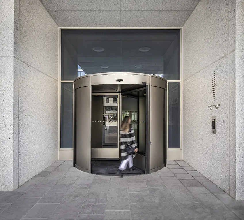 antwerp tower city vibe entrance revolving door walking lady